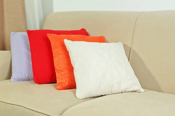 Colorful pillows on sofa — Stock Photo, Image