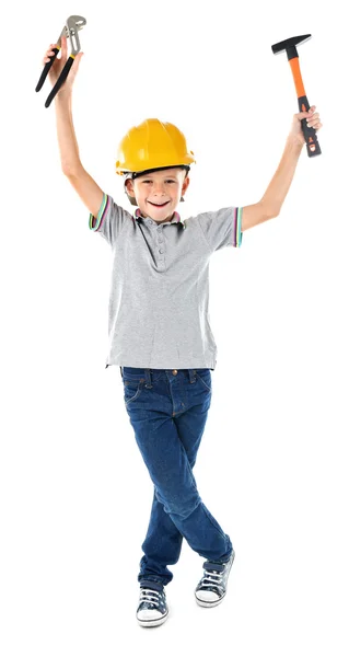 Boy in yellow helmet with building equipment — Stock Photo, Image
