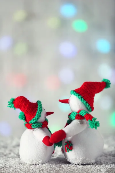 Cute snowmen on Christmas background — Stock Photo, Image