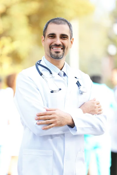 Happy Doctor Unfocused Medical Team Outdoors — Stock Photo, Image