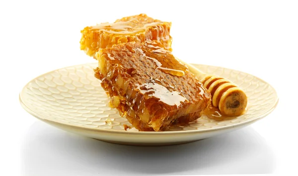 Honungskakor på plattan isolerad på vit — Stockfoto