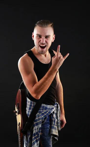 Young man with electric guitar — Stock Photo, Image