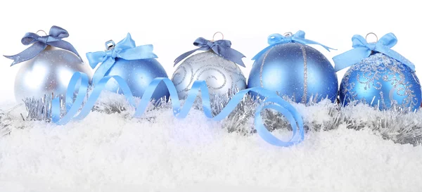 Christmas balls on snow with white background — Stock Photo, Image