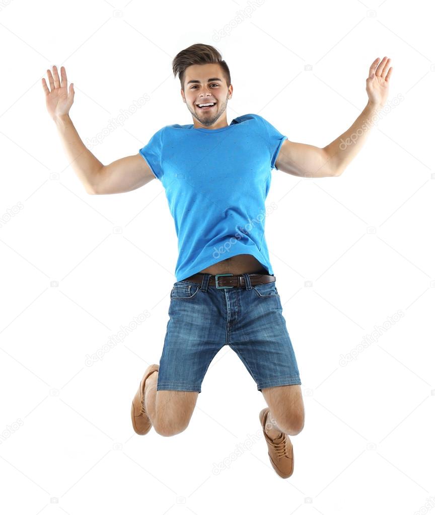 Active guy jumping in joy