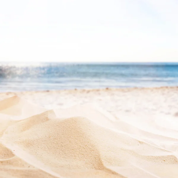 Zand op zee achtergrond — Stockfoto