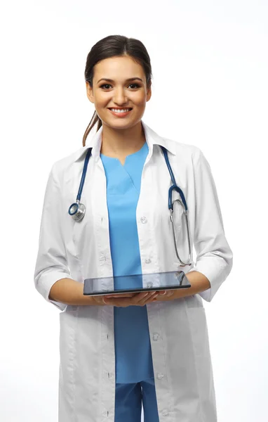 Smiling medical doctor holding a tablet — Stock Photo, Image