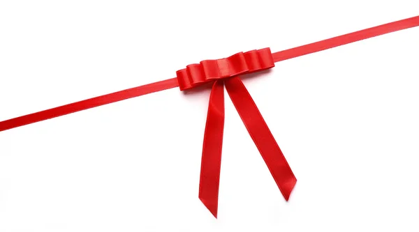 Shiny red ribbon with bow — Stock Photo, Image