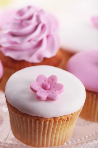 Tasty cupcake on stand, close-up — Stock Photo, Image