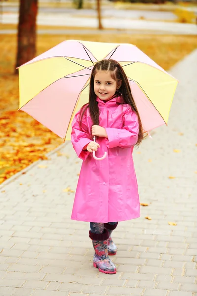 Beautiful little girl with umbrella — Stock Photo, Image