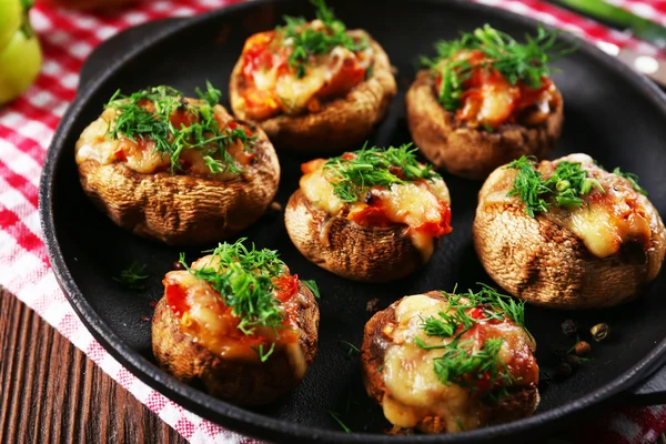 A frying pan with stuffed mushrooms on the table — Stock Photo, Image