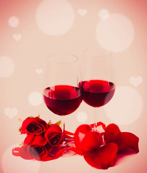 Red wine, roses and ribbon — Stock Photo, Image