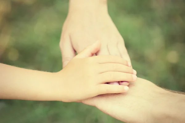 Hands of family outdoors — Stock Photo, Image