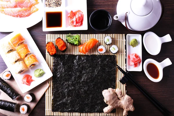The process of making sushi and rolls, top view — Stock Photo, Image