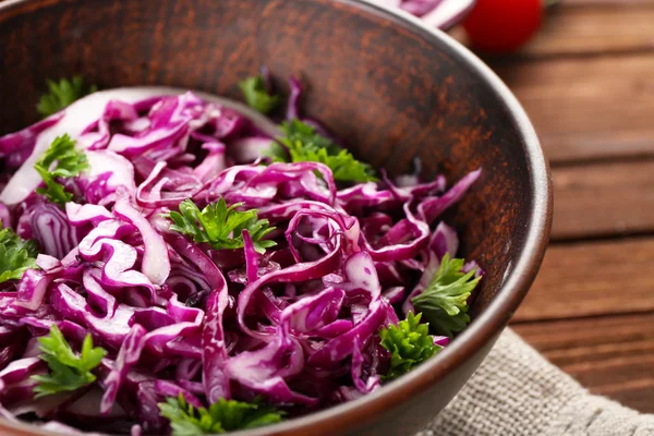 Red cabbage salad served on plate closeup — Stock Photo, Image