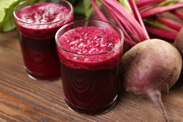 Glasses of beet juice with vegetables