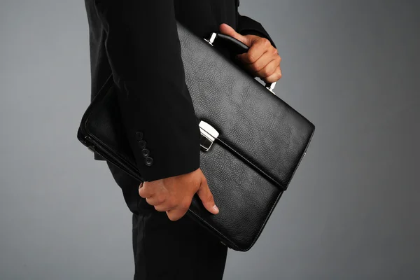 Elegant man in suit with briefcase — Stock Photo, Image