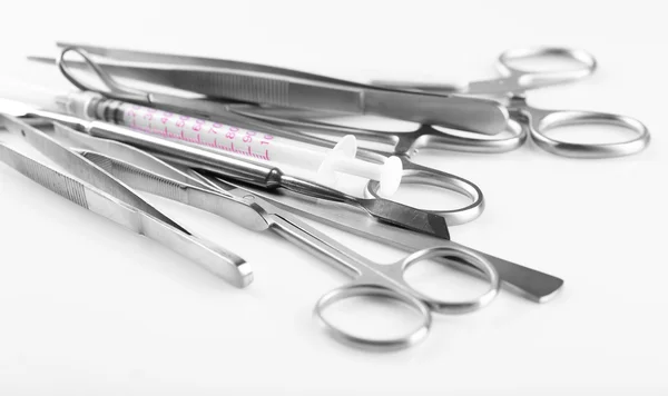 Surgery instruments on white — Stock Photo, Image