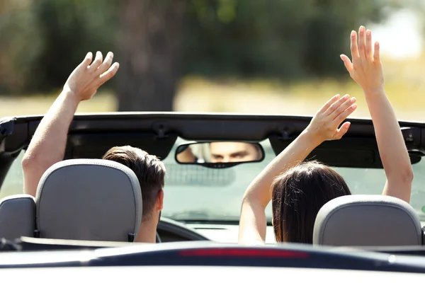 Couple in cabriolet car — Stock Photo, Image