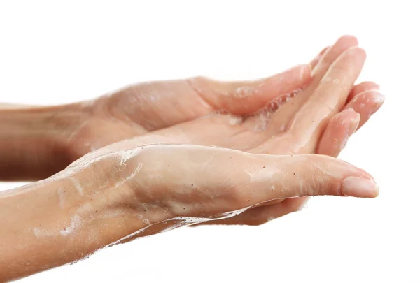 Mains de femme utilisant le gommage — Photo