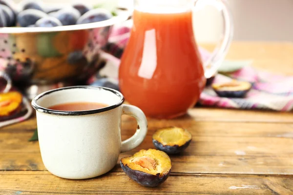 Plum Juice in jar and mug with fresh fruits — Stock Photo, Image