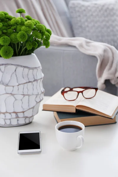 Cup of coffee with books — Stock Photo, Image