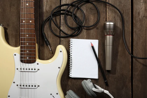 Electric guitar with headphones — Stock Photo, Image