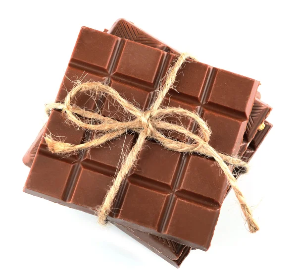 Melk chocolade bar met strik op een houten achtergrond kleur — Stockfoto