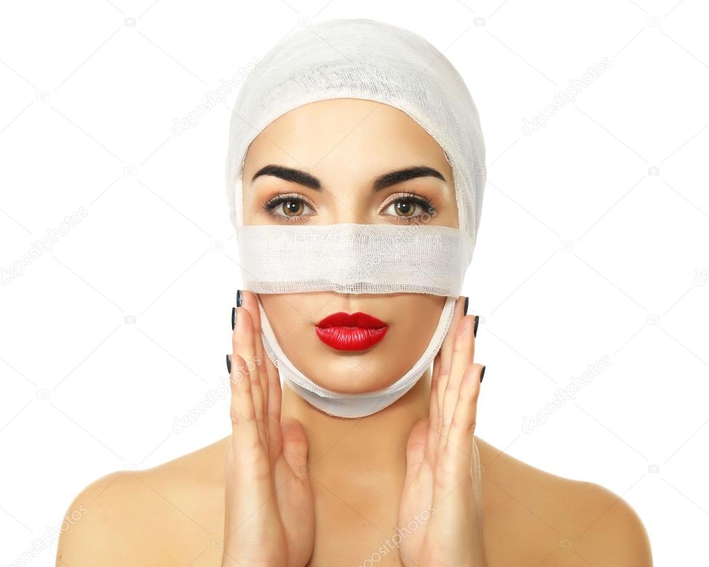 woman with a gauze bandage on her head and nose