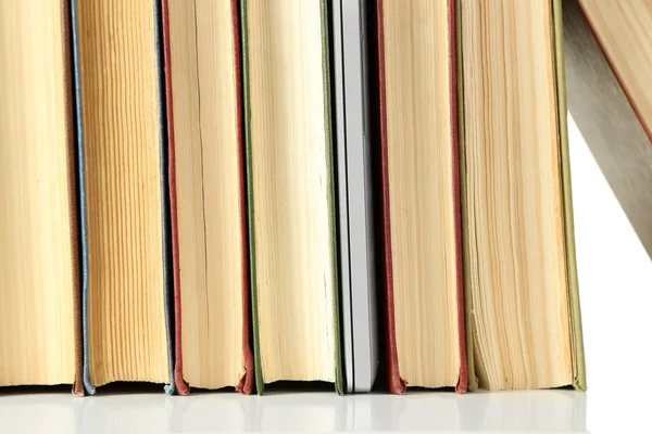 Stack of books with laptop — Stock Photo, Image