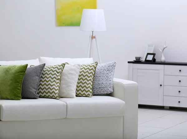 Sofa with colorful pillows — Stock Photo, Image