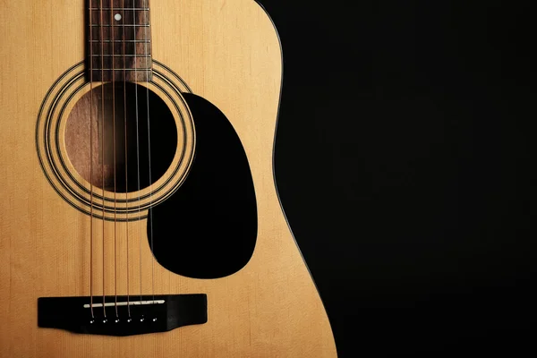 Guitar on black background — Stock Photo, Image