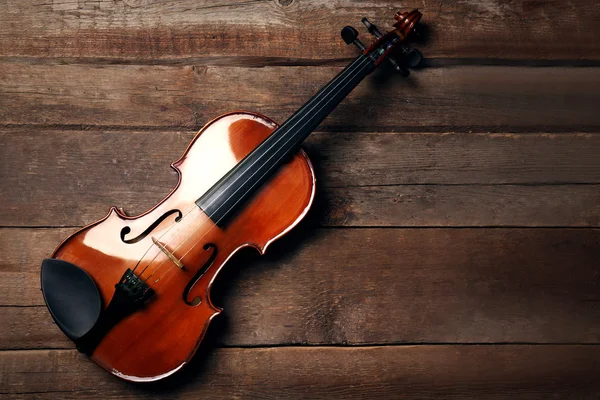 Violino su sfondo di legno — Foto Stock