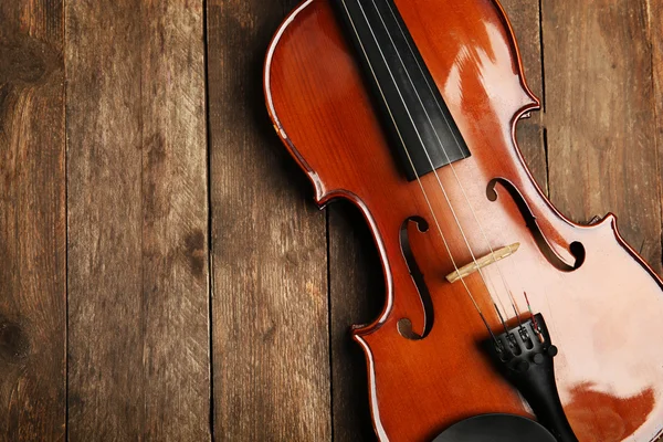 Violin på trä bakgrund — Stockfoto