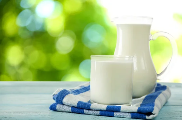 Pitcher and glass of milk — Stock Photo, Image