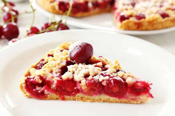 Tasty homemade pie with cherries on table close up — Stock Photo, Image