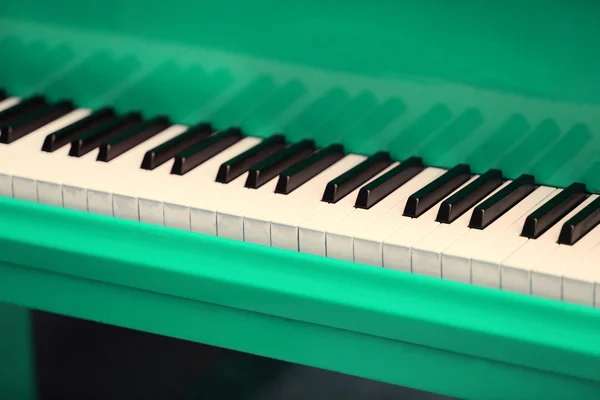 Piano keys of green piano — Stock Photo, Image