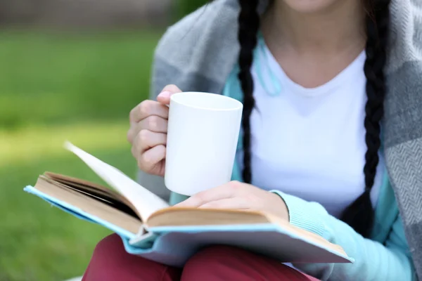 Young woman with book — Stock Photo, Image