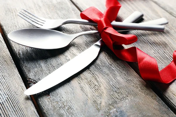 Cutlery tied with ribbon Stock Picture