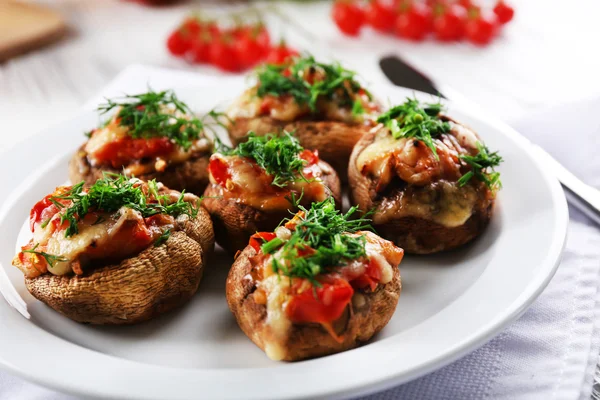 Served table with stuffed mushrooms on white wooden background, close-up — Stock Photo, Image