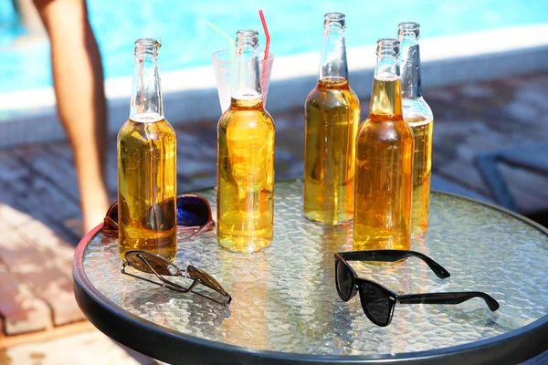 Cold beer bottles on table — Stock Photo, Image