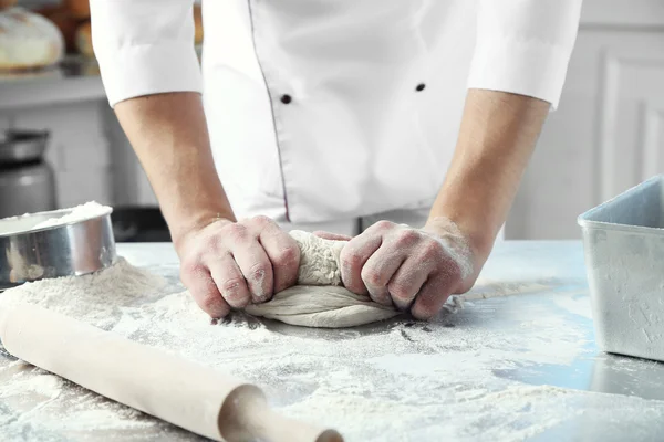 Making dough by male hands — Stock Photo, Image