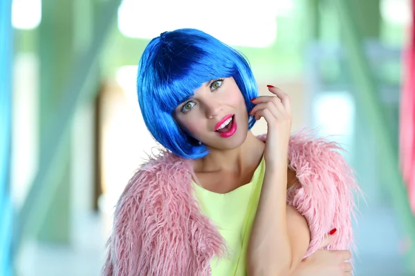 Young woman with blue hairstyle — Stock Photo, Image