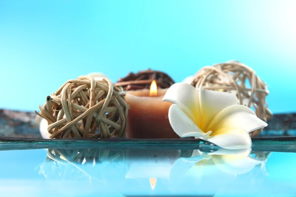 Composition of candles, decorative balls and flowers — Stock Photo, Image