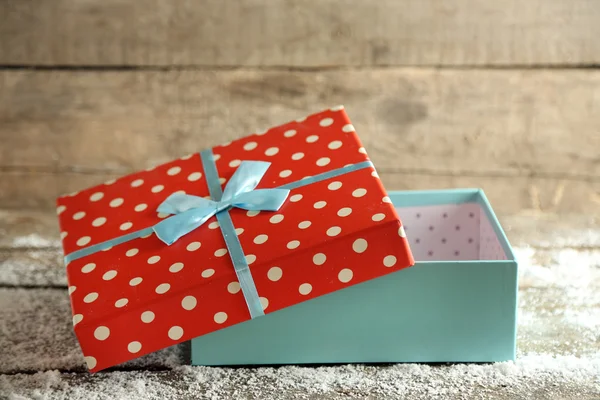 Gift boxes on wooden background — Stock Photo, Image