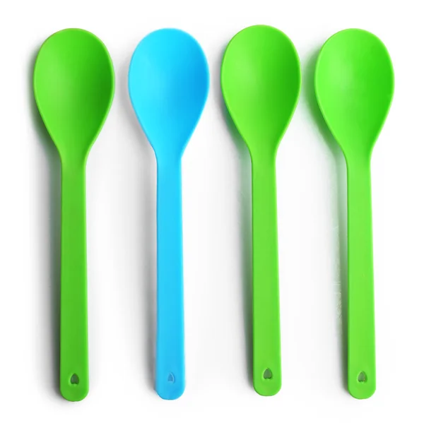 Disposable colourful spoons — Stock Photo, Image