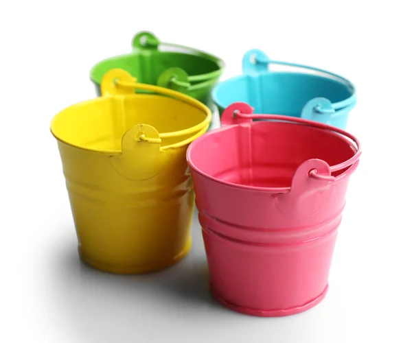 Four buckets of different colours — Stock Photo, Image