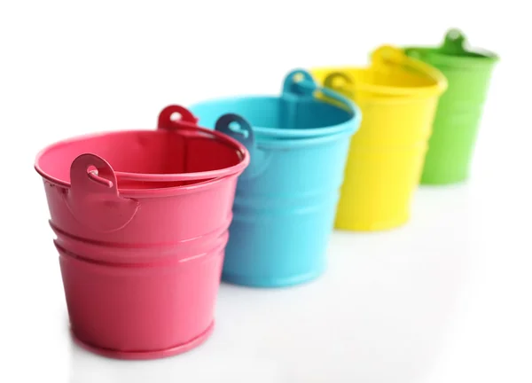 Four buckets of different colours — Stock Photo, Image