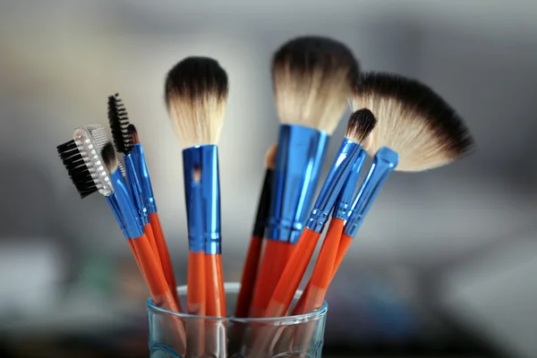 Cosmetic brushes in glass — Stock Photo, Image