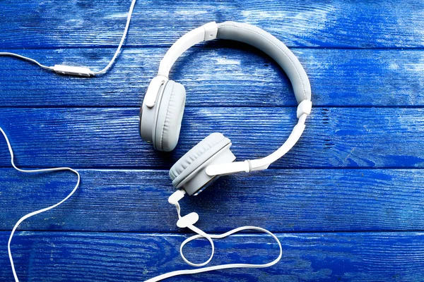 Headphones on wooden background — Stock Photo, Image