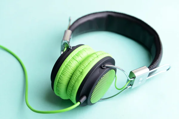 Zelená černá sluchátka — Stock fotografie